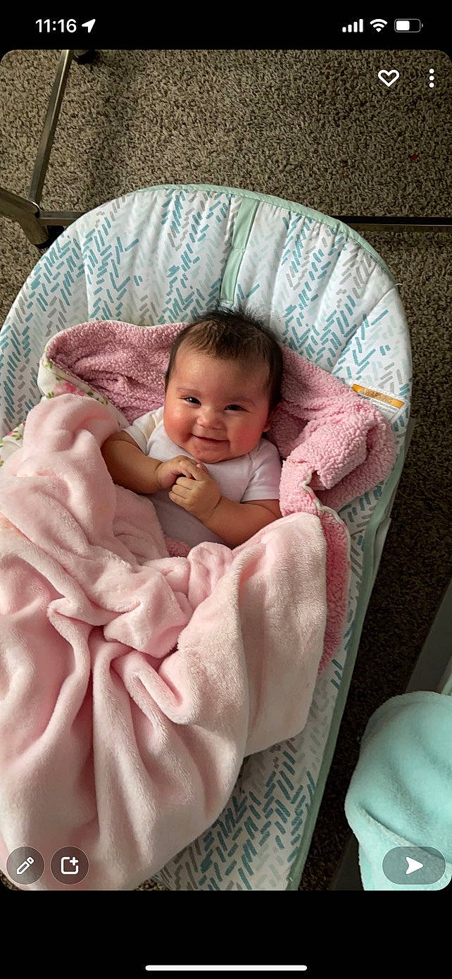 Kapri Mozes joined the competition — help win amazing prizes! baby, baby_products, baby_toddler_clothing, chair, cheek, child, comfort, infant_bed, joy, linens, nap, person, pink, product, room, sitting, skin, sleep, smile, toddler