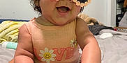 Anastassia joined the competition — help win amazing prizes! baby, child, sunglasses, smiling, bow, cute, indoor, bed, clothing, hand, foot, person, happy, daisy, love, infant, pink, accessory, face, portrait