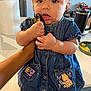 Anastassia joined the competition — help win amazing prizes! toddler, child, denim_dress, winnie_the_pooh, toy_car, hand, kitchen, paper_towel, travel_mug, plate, scrambled_eggs, curious, cute, indoor, person, clothing, baby, face, portrait, holding