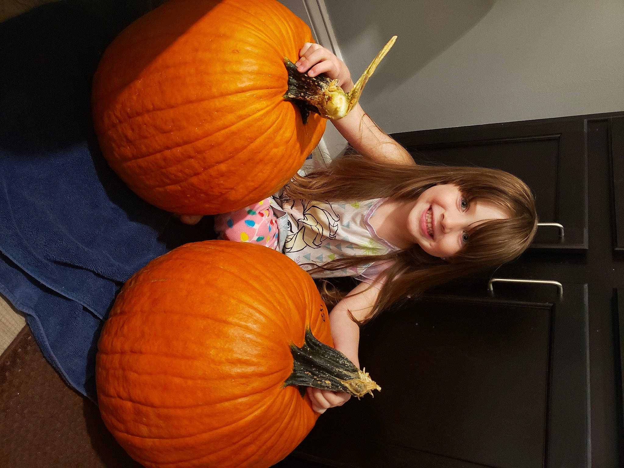 Danielle joined the competition — help win amazing prizes! calabaza, cucurbita, face, food, fruit, gourd, hair, hand, head, human_body, joy, natural_foods, orange, organ, person, plant, pumpkin, smile, squash, vegetable