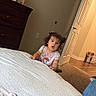 Valentina joined the competition — help win amazing prizes! child, toddler, portrait, indoors, bedroom, bed, blanket, sitting, standing, curly_hair, hair_bows, pink_shirt, cartoon_shirt, surprised, curious, face, smiling, dresser, open_door, household_items