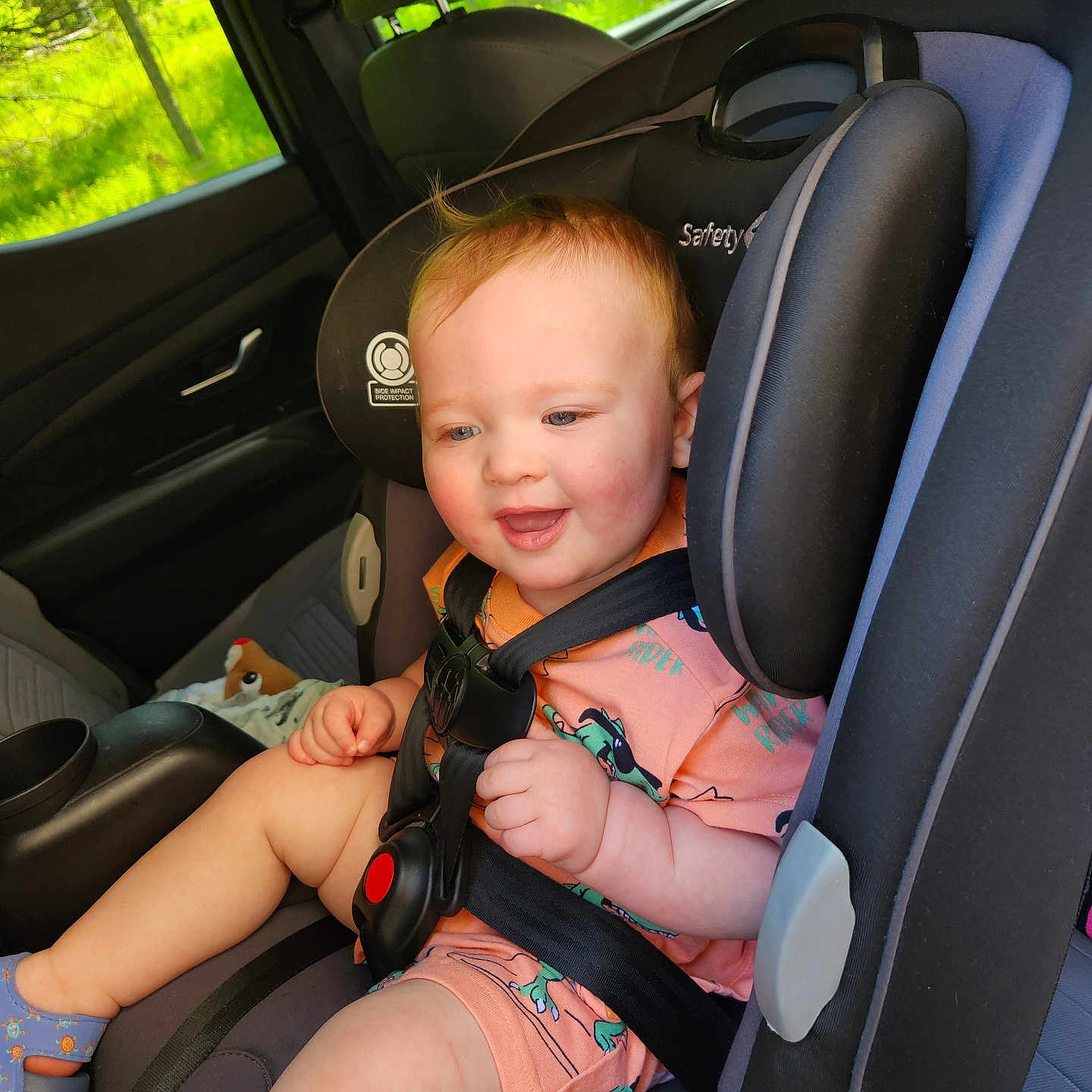 Derek is registered to the contest to win money with this photo: accessories, baby, belt, car, car_interior, carseat, chair, clothing, cushion, face, footwear, furniture, head, homedecor, person, photography, portrait, sandal, transportation, vehicle