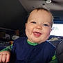 Derek is registered to the contest to win money with this photo: appliance, baby, babylaughing, bodypart, ceilingfan, cushion, device, electricaldevice, face, finger, hand, happy, head, homedecor, laughing, mouth, person, photography, portrait, smile