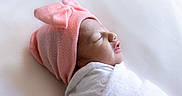 Ovi joined the competition — help win amazing prizes! newborn, baby, infant, sleeping, pink_hat, bow, swaddled, blanket, white, soft, cute, profile, peaceful, rest, child, headwear, portrait, closeup, indoors, baby_clothing