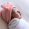 newborn, baby, infant, sleeping, pink_hat, bow, swaddled, blanket, white, soft, cute, profile, peaceful, rest, child, headwear, portrait, closeup, indoors, baby_clothing
