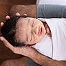 newborn, baby, infant, sleeping, wrapped, blanket, hands, adult, cradling, closeup, soft, peaceful, portrait, human, skin, face, resting, gentle, comfort, tender
