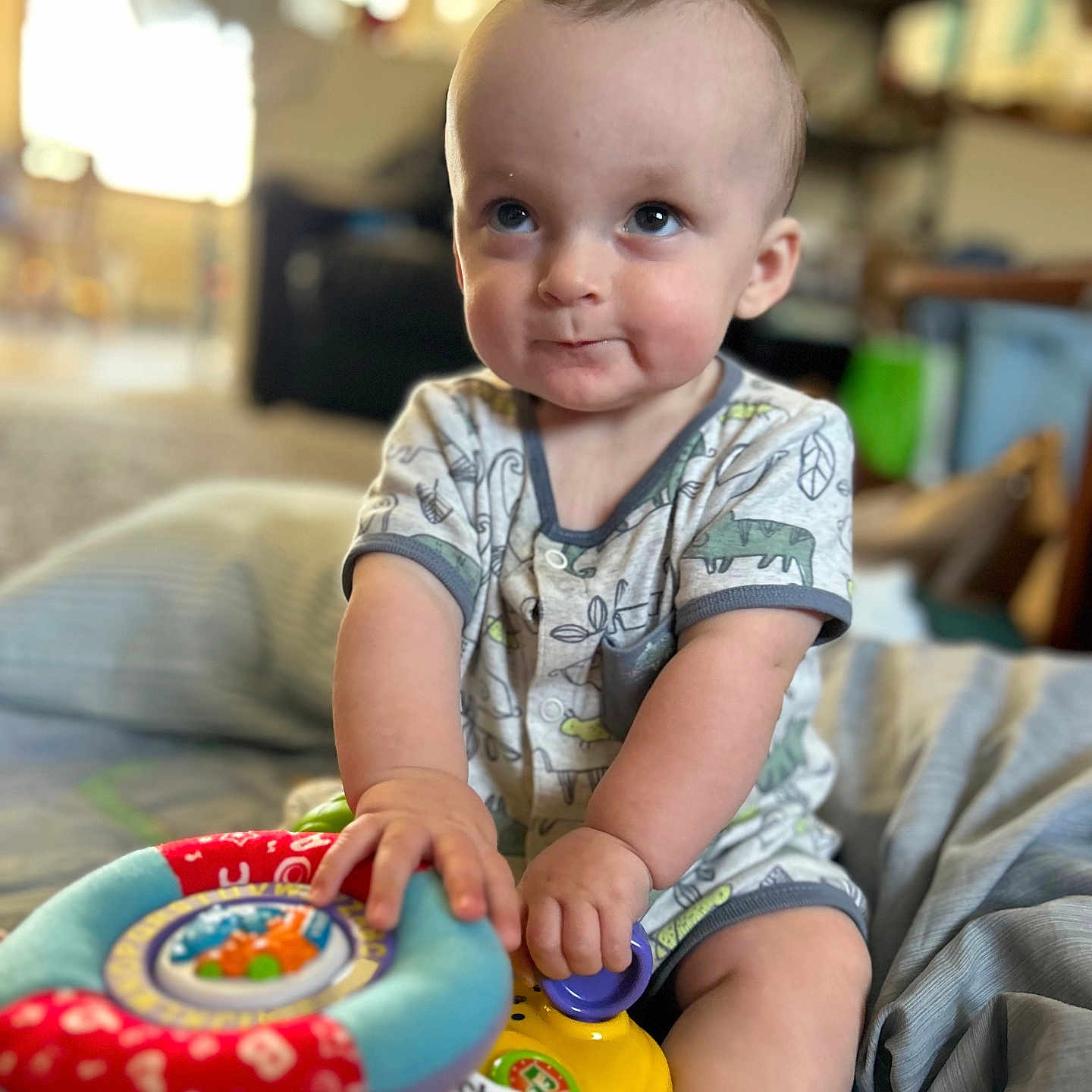 Alexander joined the competition — help win amazing prizes! architecture, baby, bodypart, building, clothing, couch, face, finger, furniture, hand, happy, head, indoors, person, photography, portrait, sitting, smile, t_shirt, toy