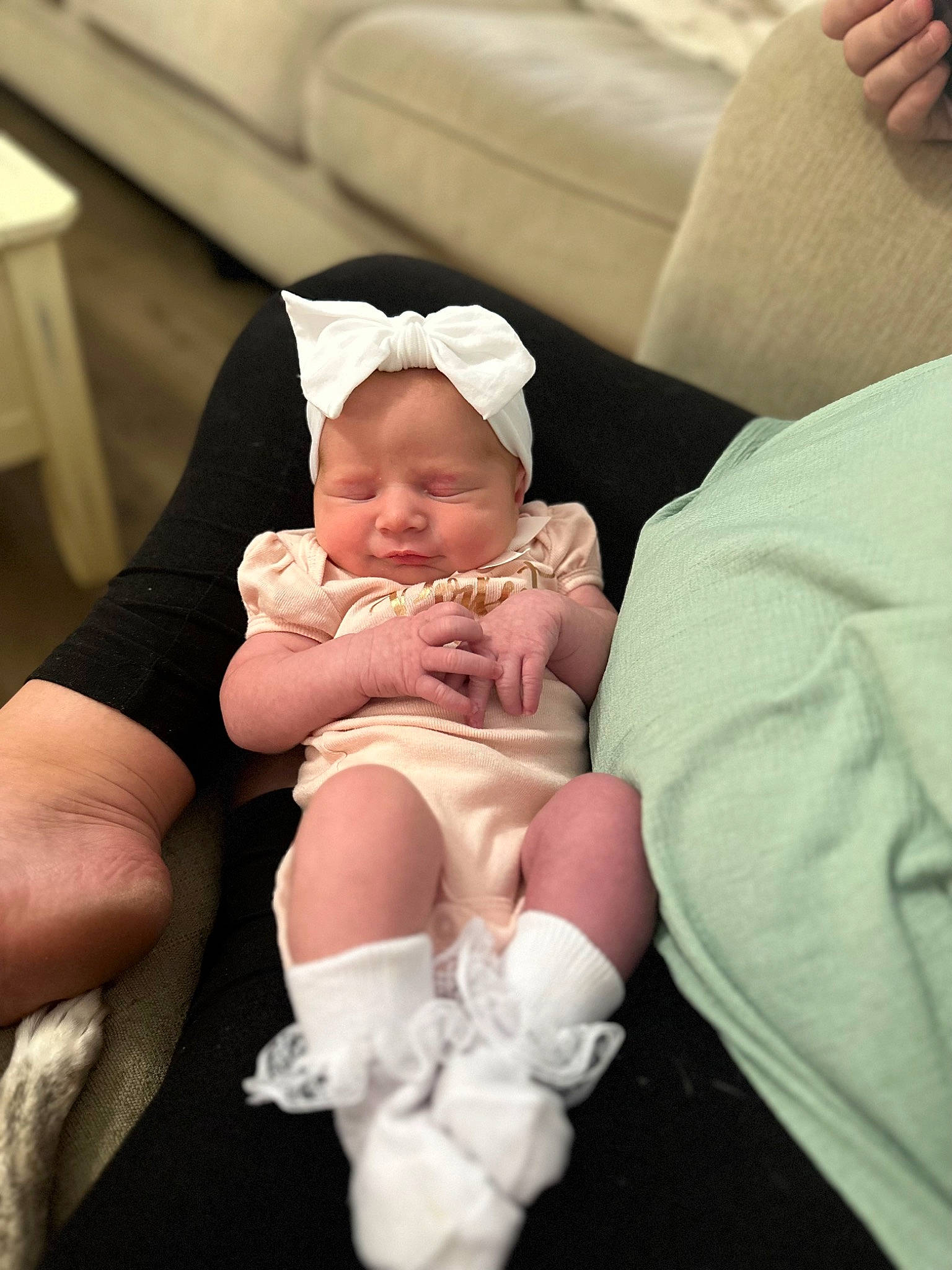 Audrey is registered to the contest to win money with this photo: abdomen, baby, baby_products, baby_toddler_clothing, child, comfort, event, eye, finger, gesture, happy, hat, human_leg, knee, leg, nail, person, skin, thigh, thumb