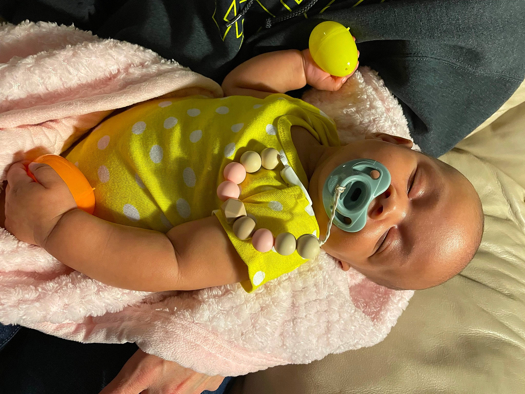 Legacy is registered to the contest to win money with this photo: baby, baby_toddler_clothing, child, comfort, eyewear, finger, foot, fun, goggles, happy, mouth, nail, pattern, person, skin, sleeve, smile, sunglasses, thumb, toddler