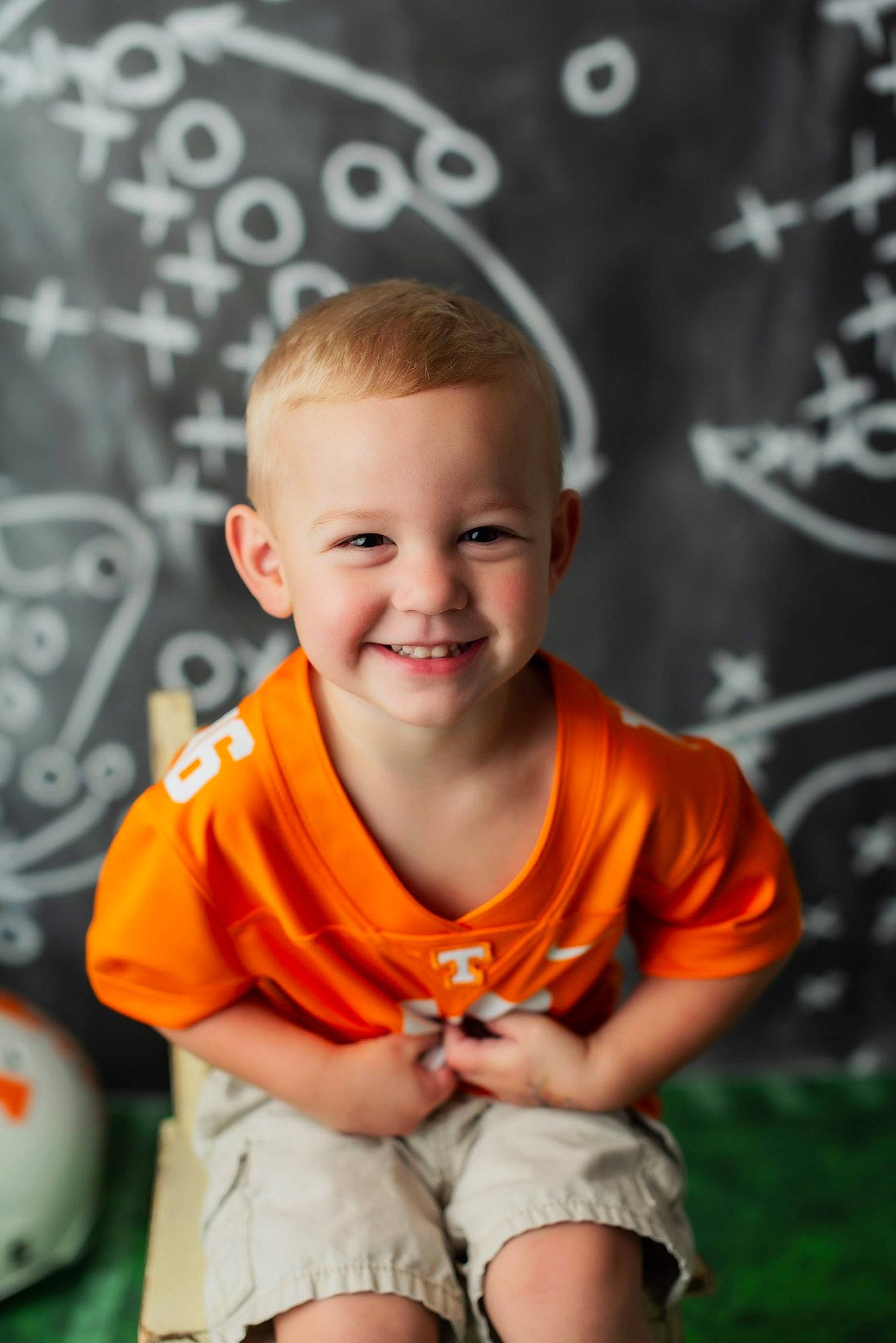 Neyland joined the competition — help win amazing prizes! baby, cheek, child, facial_expression, fun, happy, head, joy, orange, person, photography, play, portrait_photography, sitting, smile, t_shirt, toddler