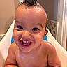 baby, child, bath, bathtub, wet_hair, smiling, happy, water, skin, face, eyes, mouth, teeth, arms, indoors, moisture, cute, joy, infant, playful