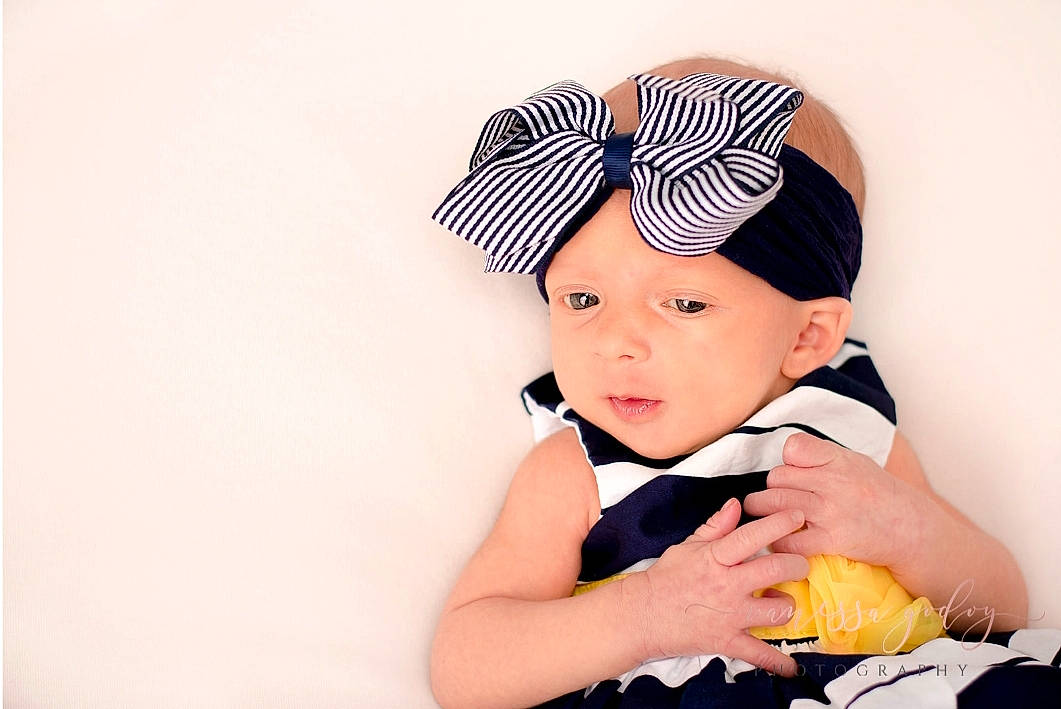 Mayzie joined the competition — help win amazing prizes! baby, baby_bloomers, baby_toddler_clothing, beanie, cap, child, clothing, costume_accessory, costume_hat, fashion_accessory, hair_accessory, headband, headgear, headpiece, person, toddler, yellow