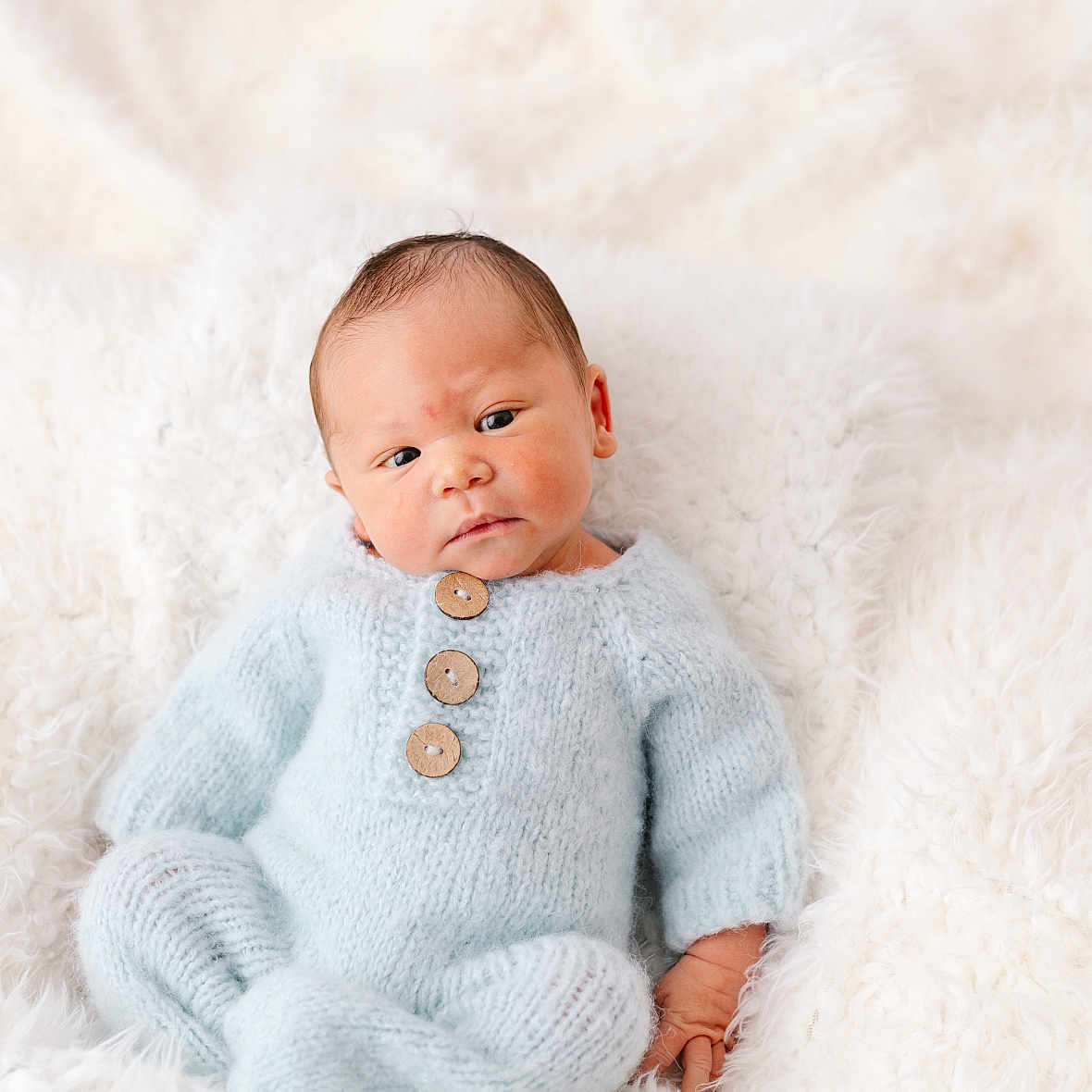 Klay is registered to the contest to win money with this photo: baby, blanket, bodypart, clothing, face, finger, hand, happy, head, knitwear, longsleeve, newborn, person, photography, portrait, sitting, sleeve, smile, sweater, sweatshirt