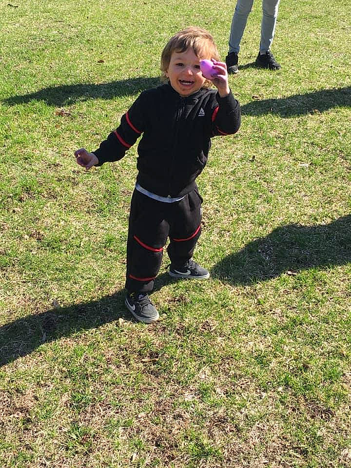 Dominik joined the competition — help win amazing prizes! active_pants, boot, child, competition_event, footwear, fun, grass, happy, joy, knee, leisure, people_in_nature, person, plant, player, recreation, running, smile, sneakers, sports