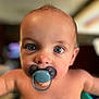 Hendrix joined the competition — help win amazing prizes! baby, pacifier, face, blue_eyes, skin, infant, closeup, portrait, child, cute, expression, indoors, person, young, head, mouth, looking, human, soft_light, blurred_background