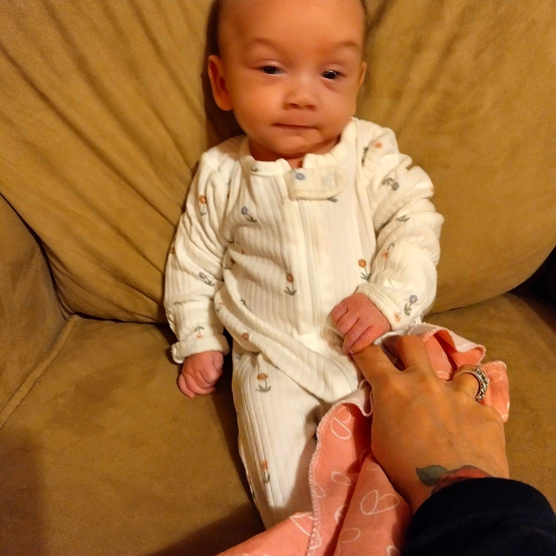 A'Myiah is registered to the contest to win money with this photo: baby, bodypart, clothing, couch, cushion, face, finger, furniture, hand, head, homedecor, longsleeve, newborn, pajamas, person, photography, portrait, shirt, sitting, sleeve