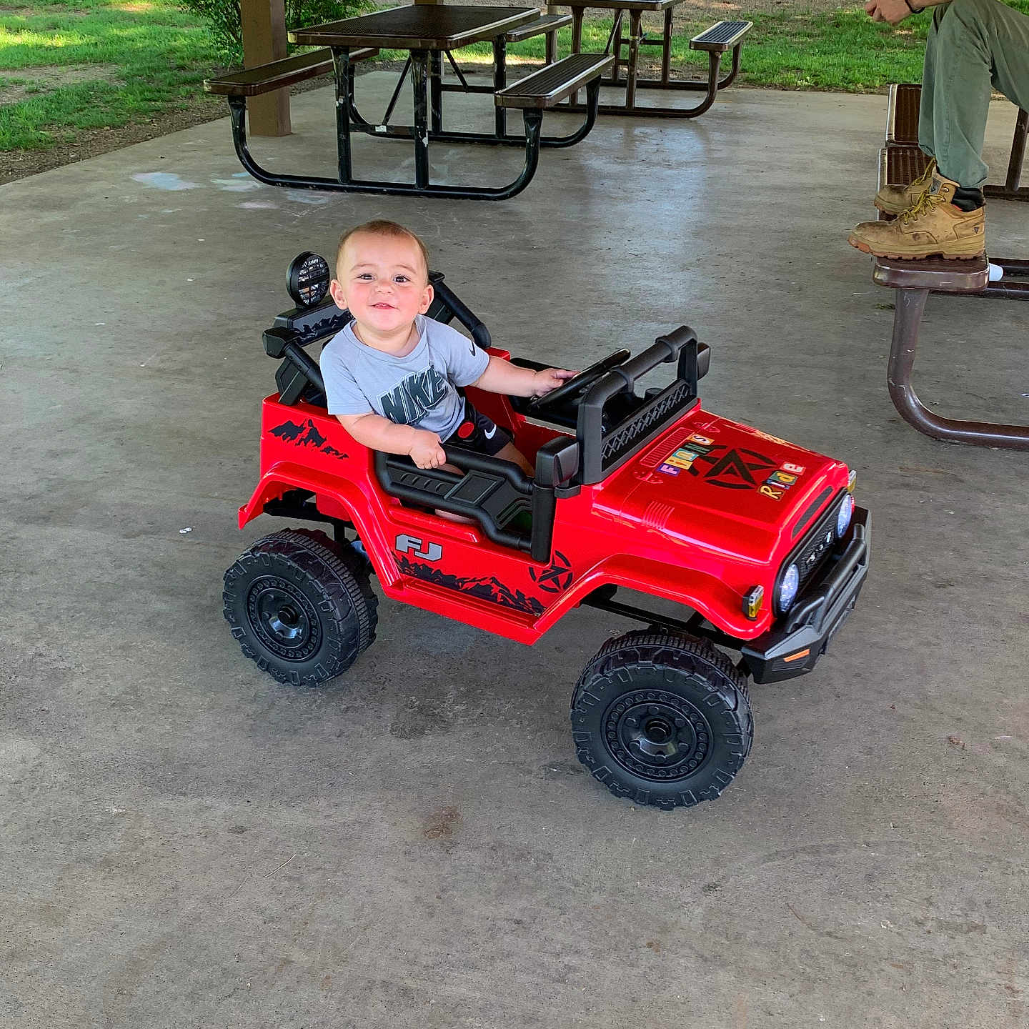 Finley is registered to the contest to win money with this photo: accessories, baby, desk, face, furniture, grass, head, lawn, nature, outdoors, park, person, photography, plant, portrait, pottedplant, summer, table, tree, vegetation