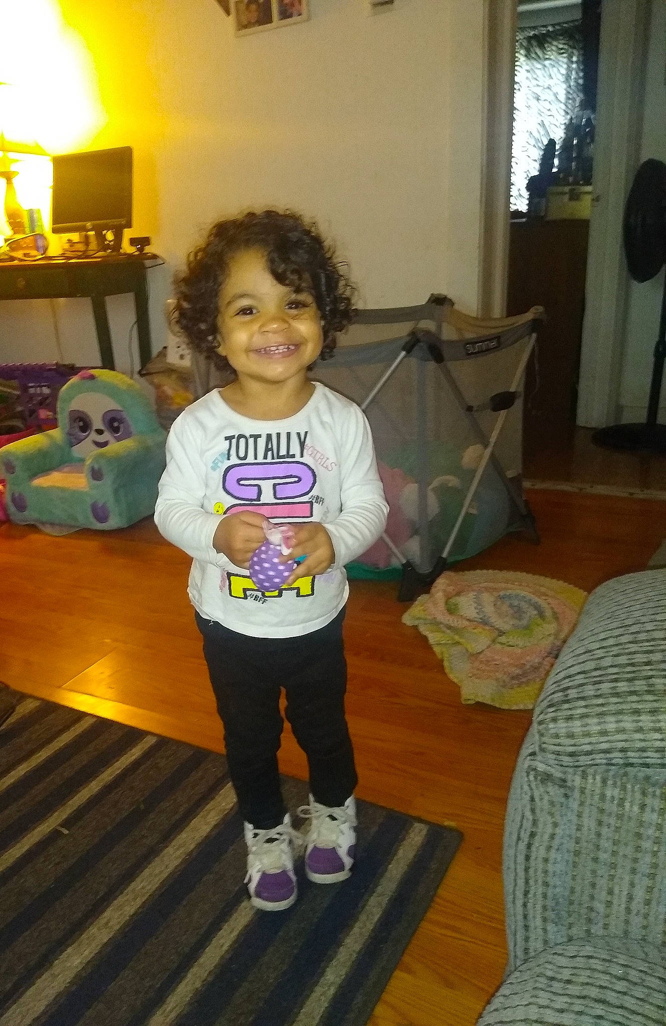 Tahiry is registered to the contest to win money with this photo: child, joy, person, standing, toddler