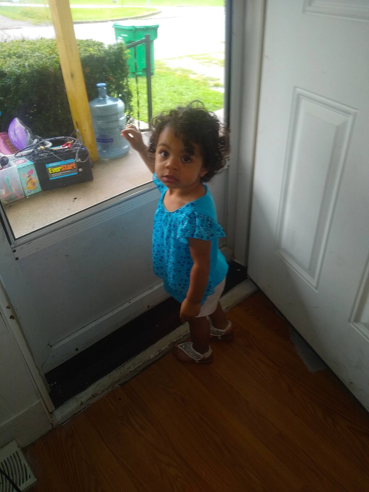 Tahiry is registered to the contest to win money with this photo: child, floor, flooring, hardwood, person, room, standing, toddler, wood