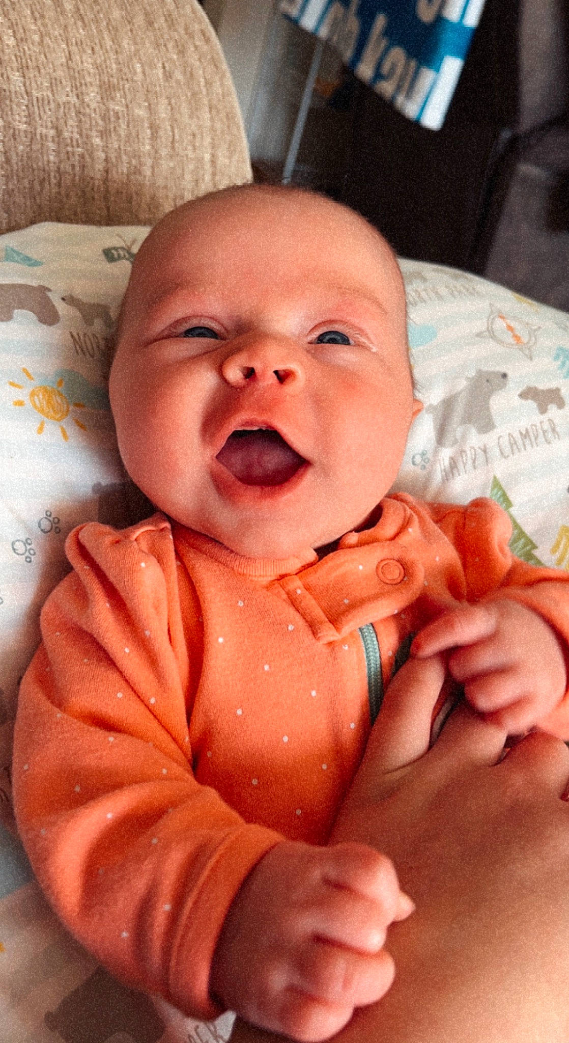 Caroline is registered to the contest to win money with this photo: baby, baby_products, baby_toddler_clothing, cheek, child, chin, comfort, event, finger, gesture, happy, lip, mouth, nose, person, skin, sleeve, smile, stomach, thumb