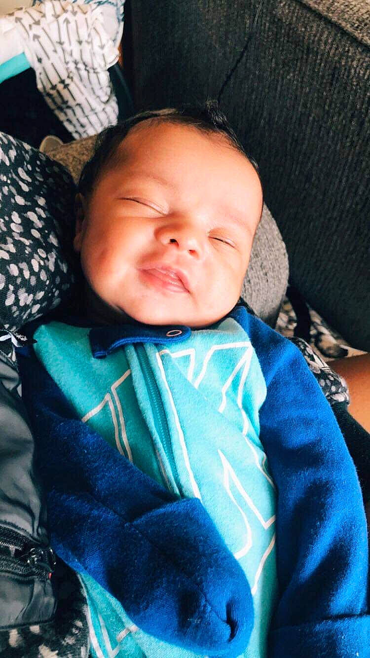 Willie is registered to the contest to win money with this photo: baby, blue, cheek, child, face, head, lip, nose, person, skin, smile, toddler