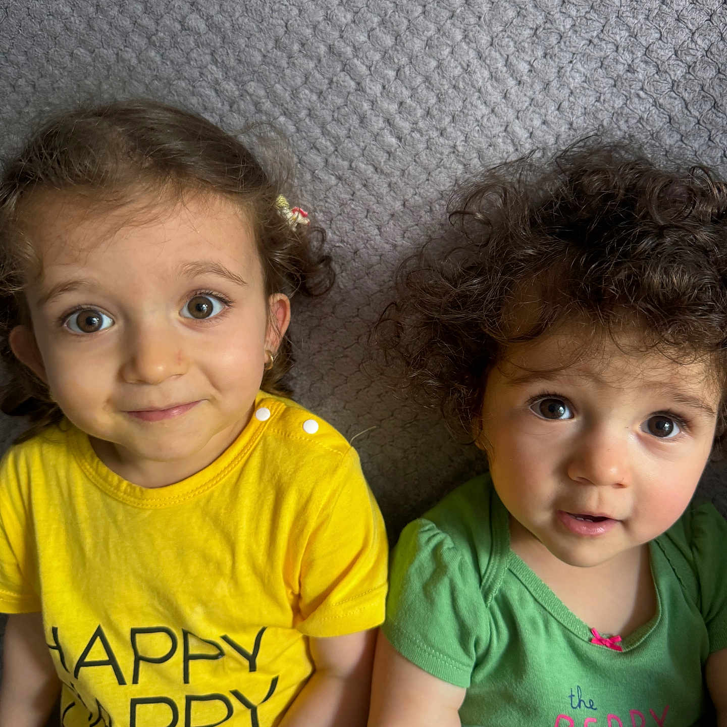 Kimberly Ana Hashem is registered to the contest to win money with this photo: baby, bodypart, child, clothing, couch, face, female, finger, furniture, girl, hair, happy, head, homedecor, person, photography, portrait, shirt, smile, t_shirt