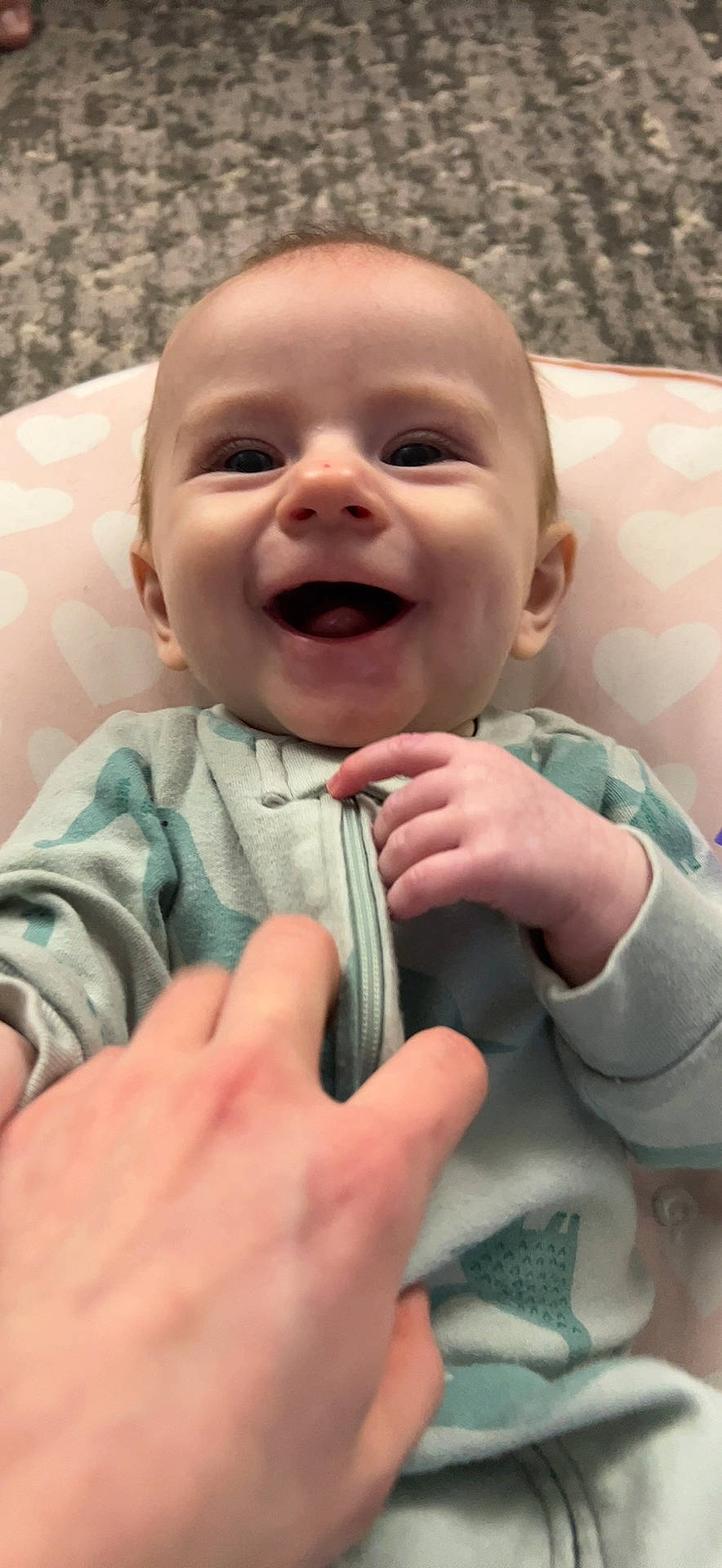 Brooks joined the competition — help win amazing prizes! baby, baby_laughing, baby_toddler_clothing, cheek, child, comfort, eyebrow, finger, gesture, grass, hand, happy, iris, lip, nose, person, skin, sleeve, smile, thumb