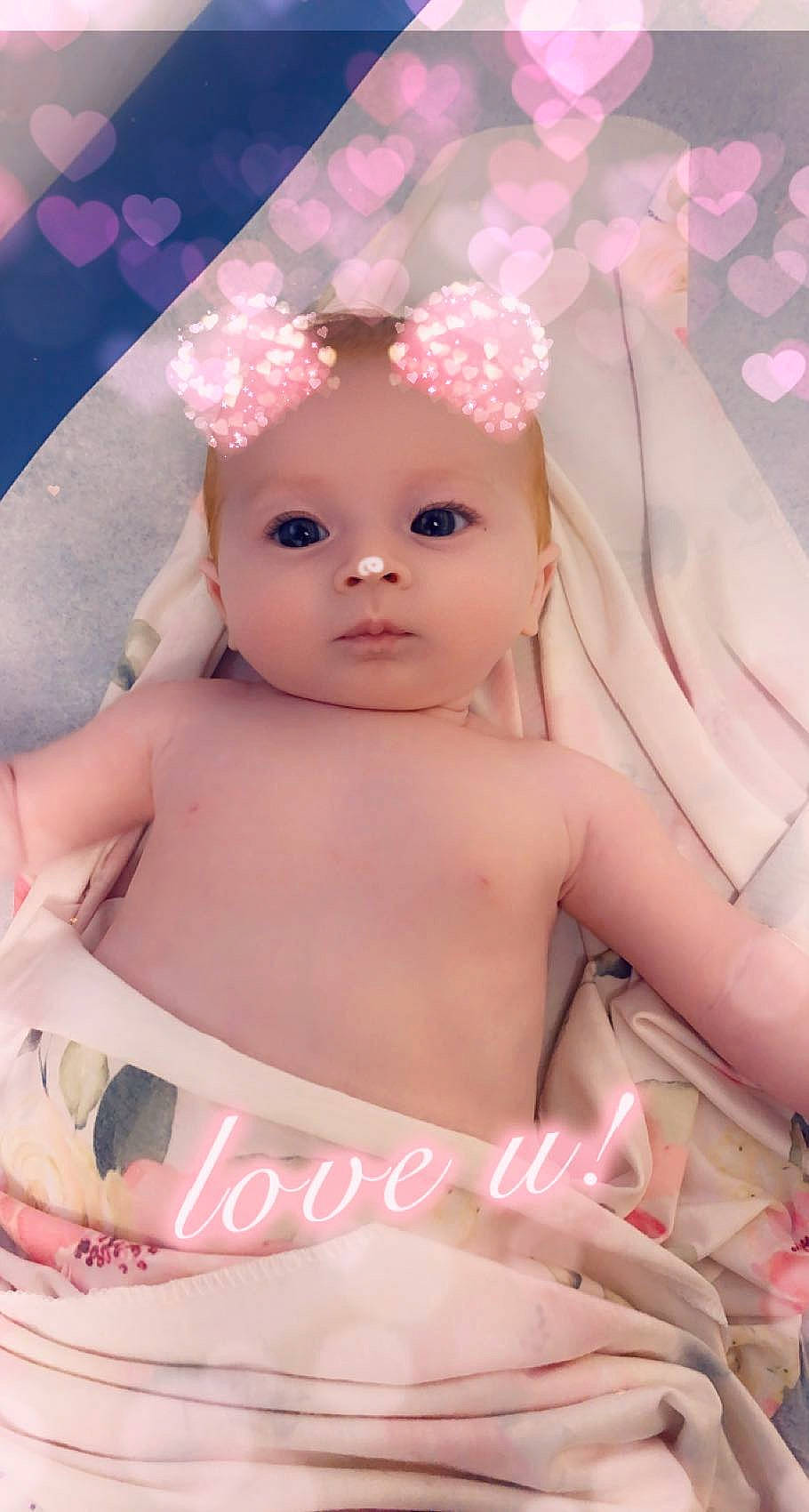 Kimberly is registered to the contest to win money with this photo: baby, cheek, chest, ear, eye, eyebrow, eyelash, fawn, finger, head, headwear, human_body, iris, lip, mouth, nose, person, pink, skin, textile