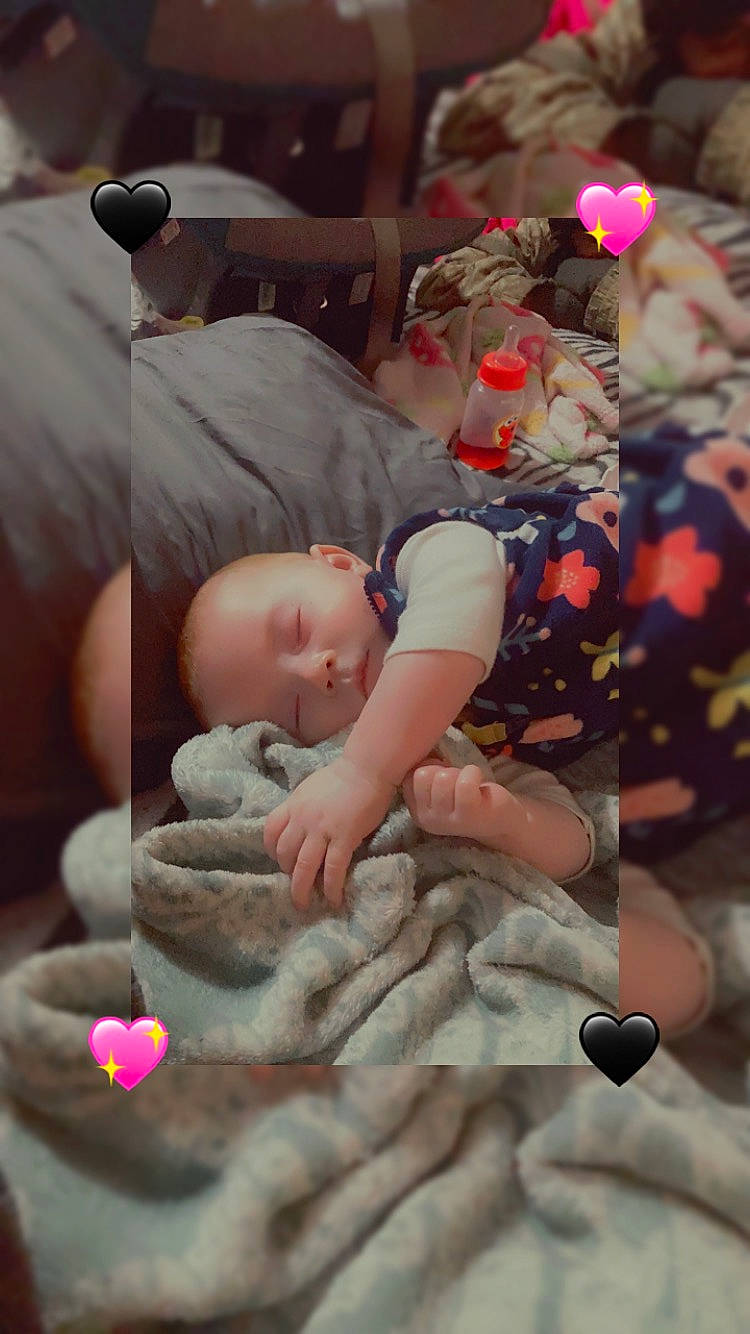 Kimberly is registered to the contest to win money with this photo: baby, baby_products, baby_toddler_clothing, cheek, child, comfort, finger, hat, joint, linens, mouth, nail, pattern, person, pink, sitting, skin, thigh, thumb, toddler