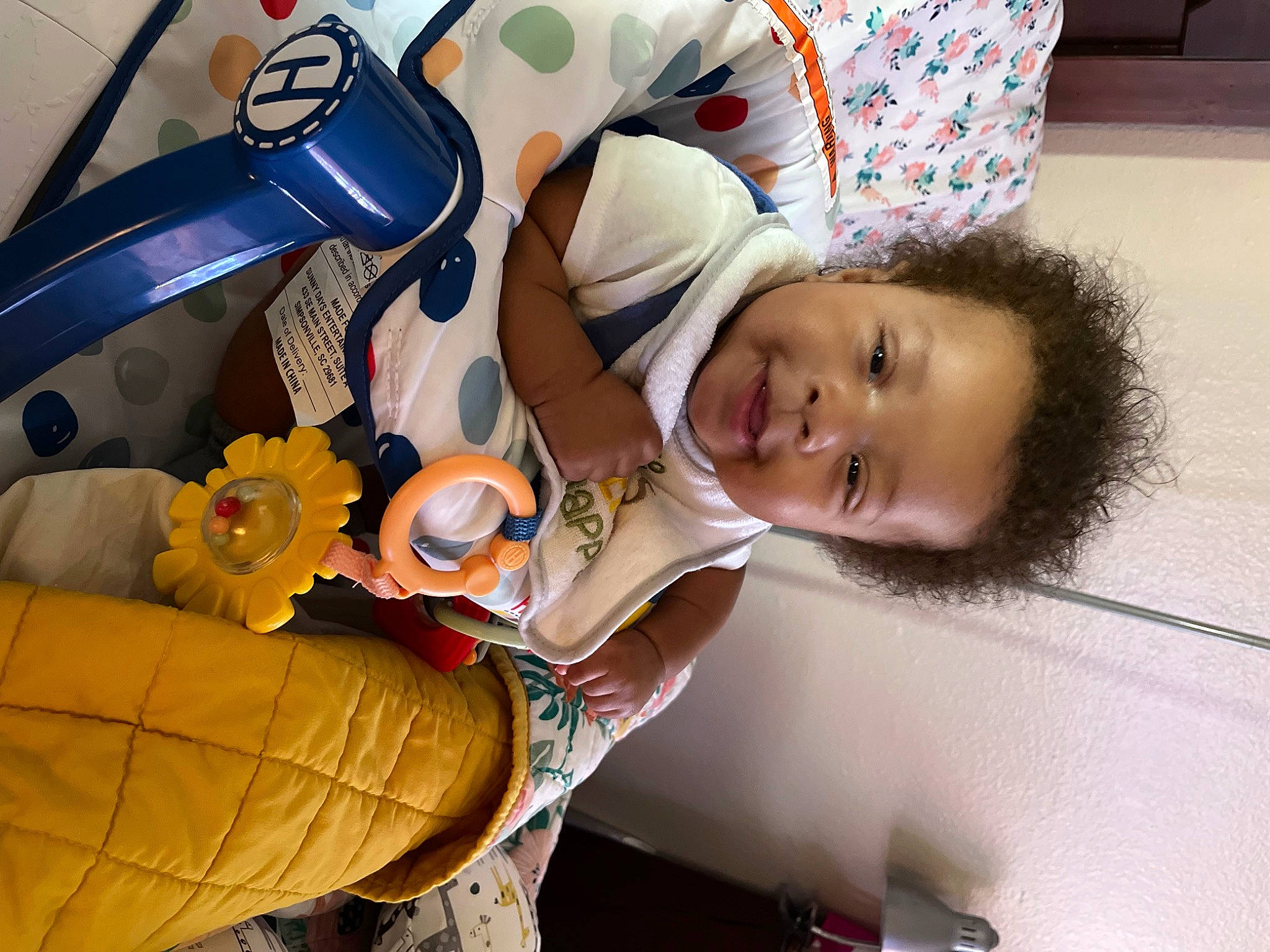 Kevin joined the competition — help win amazing prizes! baby, baby_products, baby_toddler_clothing, child, comfort, fun, happy, hat, human_body, person, room, sitting, smile, toddler, vacation