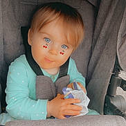 Bailey joined the competition — help win amazing prizes! toddler, child, stroller, baby, blue_eyes, cherry_sticker, onesie, mint_green, hand, face, seatbelt, snack_wrapper, gray_fabric, cute, indoor, portrait, young_child, sitting, infant, expression