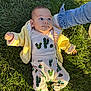 Matthew joined the competition — help win amazing prizes! baby, barefoot, cactus_pattern, casual, child, clothing, curious, cute, grass, greenery, hand, infant, lying_down, nature, outdoor, playful, portrait, soft_skin, sunlight, yellow_jacket