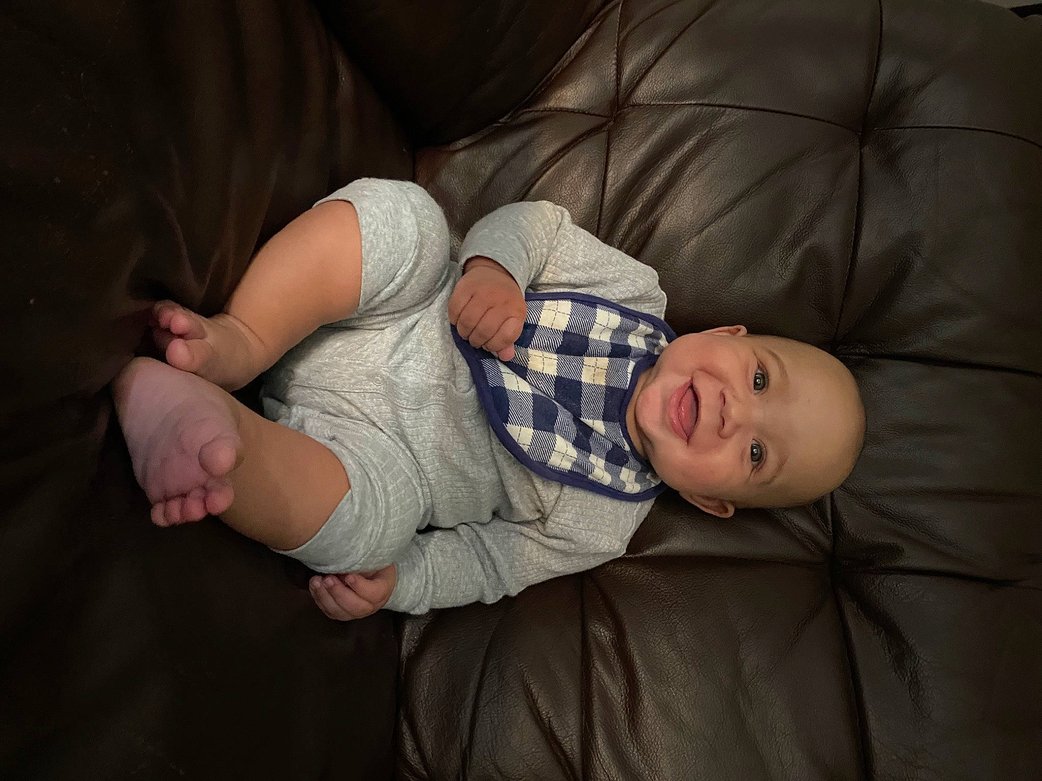 Darrell is registered to the contest to win money with this photo: baby, baby_toddler_clothing, cheek, child, comfort, elbow, flash_photography, fun, gesture, hat, human_leg, knee, lap, person, skin, sleeve, smile, toddler, tree, vertebrate