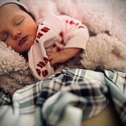 Mylah joined the competition — help win amazing prizes! baby, sleeping, blanket, soft, cozy, infant, hat, warm, rest, cute, child, comfort, peaceful, plush, portrait, closeup, face, hand, clothing, indoors