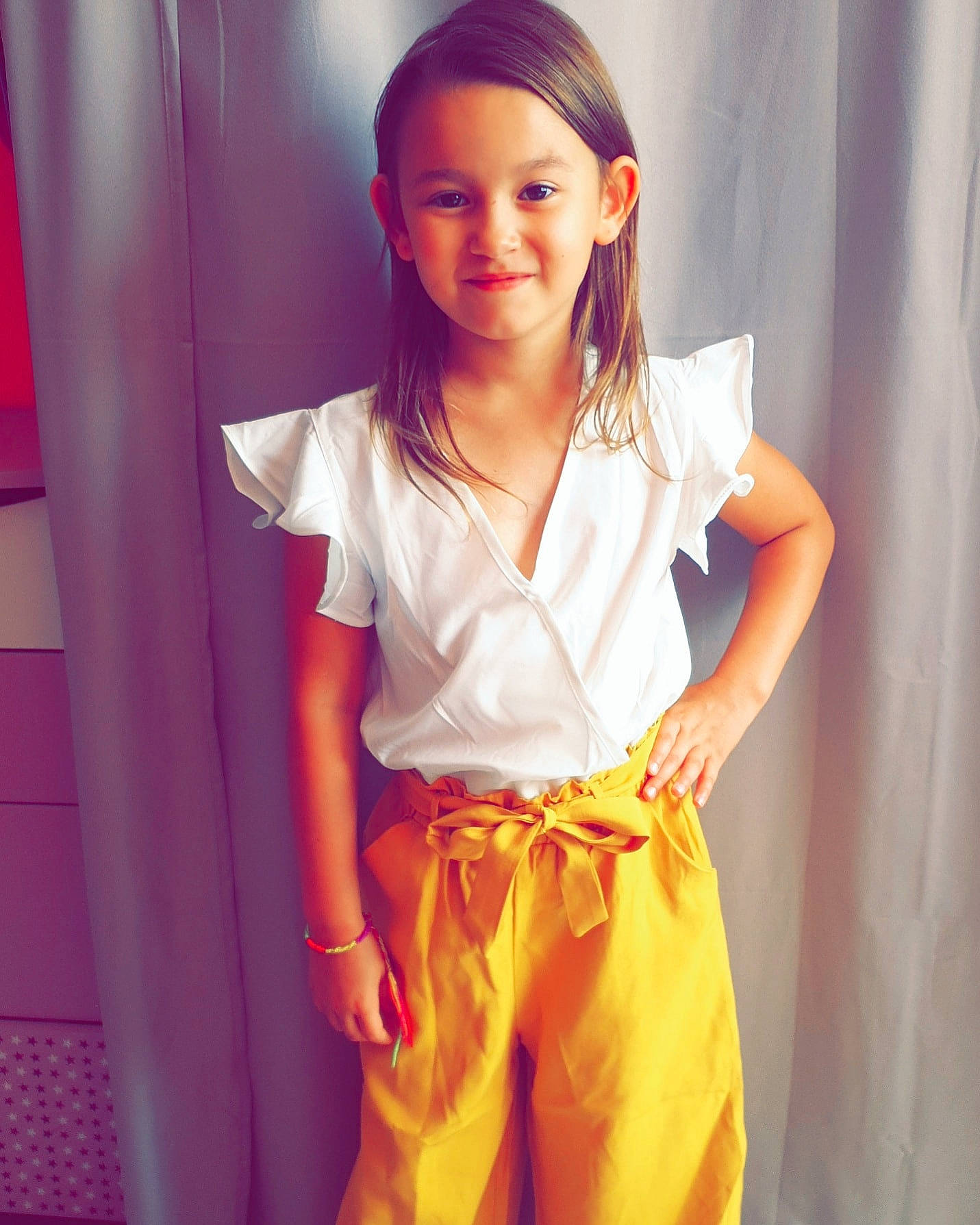 Kayla a rejoint le concours — aidez-le/la à gagner de superbes lots ! abdomen, beauty, blouse, child, child_model, clothing, fashion_accessory, joy, long_hair, model, neck, orange, person, pink, shorts, textile, waist, white, yellow