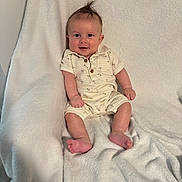 Anthony joined the competition — help win amazing prizes! baby, smile, infant, cute, sitting, white_blanket, happy, child, portrait, indoor, soft_texture, casual_clothing, short_sleeves, barefoot, young, light_skin, comfortable, cozy, one_person, small_hands