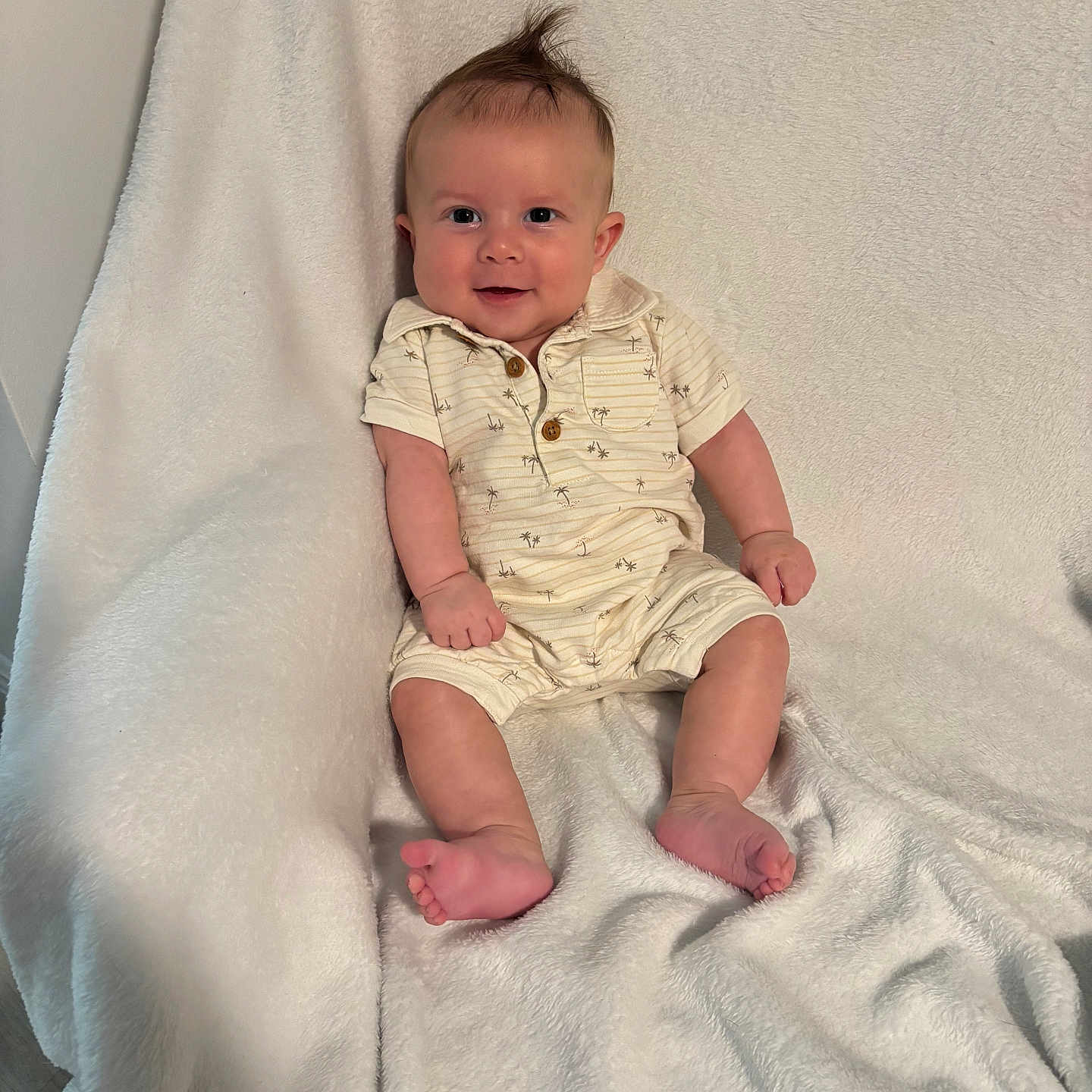 Anthony joined the competition — help win amazing prizes! baby, smile, infant, cute, sitting, white_blanket, happy, child, portrait, indoor, soft_texture, casual_clothing, short_sleeves, barefoot, young, light_skin, comfortable, cozy, one_person, small_hands
