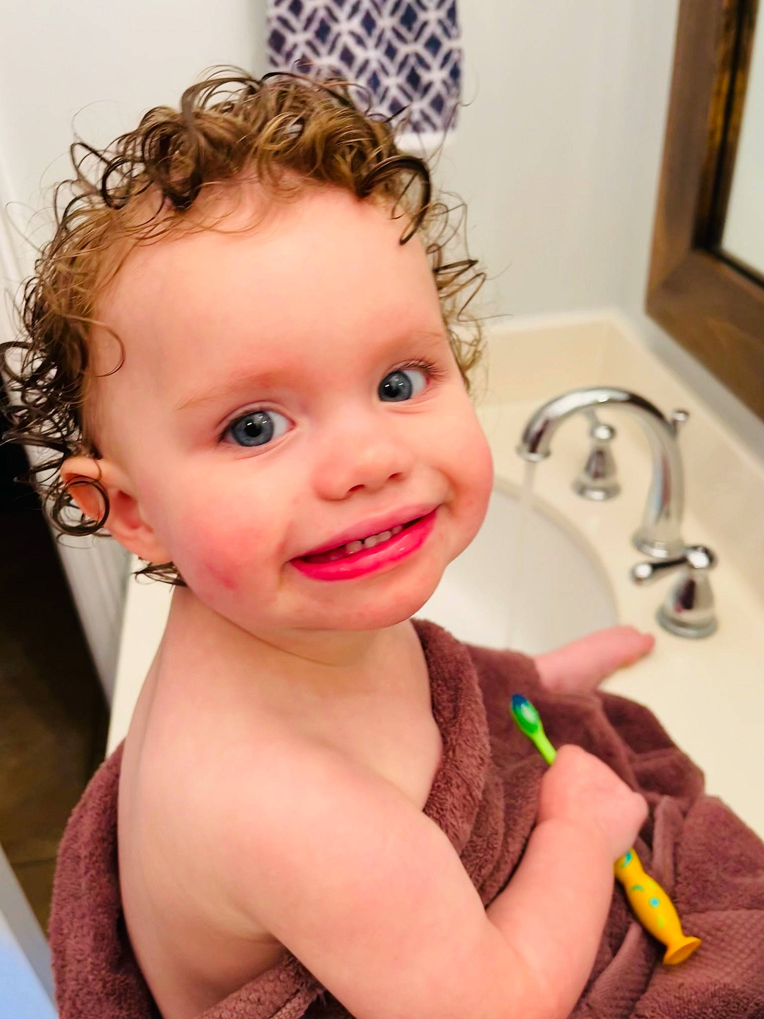 Richlyn is registered to the contest to win money with this photo: baby, bathing, cheek, chest, child, ear, eyebrow, eyelash, fun, hair, happy, joy, mouth, nose, person, picture_frame, plumbing_fixture, sink, skin, smile