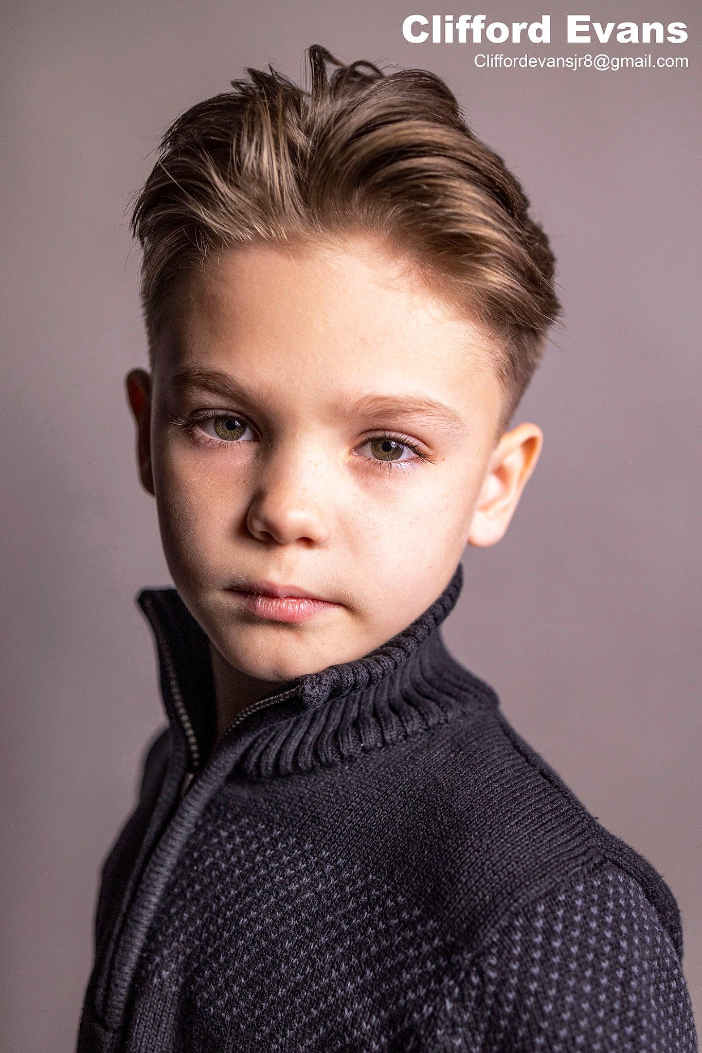 Clifford is registered to the contest to win money with this photo: black_hair, brown_hair, eyelash, fashion, fashion_design, fashion_model, flash_photography, forehead, fur, hair, jaw, lip, mohawk_hairstyle, monochrome, neck, person, portrait_photography, quiff, sleeve, wool