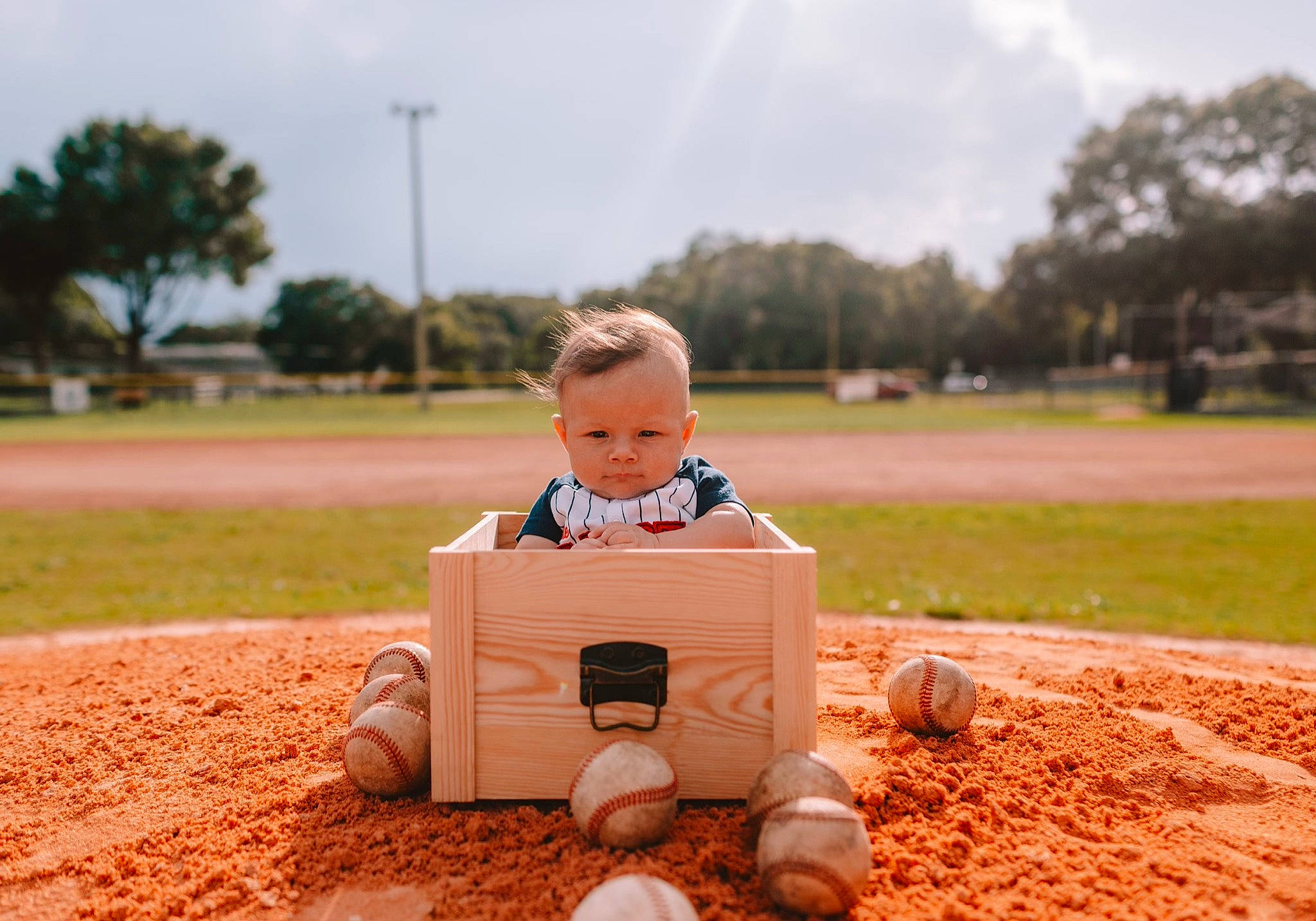Jaxton joined the competition — help win amazing prizes! asphalt, baby, city, finger, fun, grass, happy, landscape, leisure, orange, people_in_nature, person, plant, recreation, road, sky, tire, toddler, tree, wheel