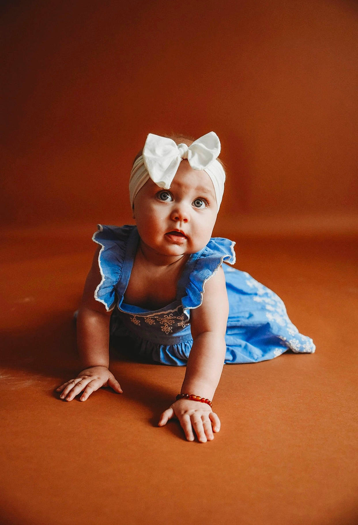 Delanie joined the competition — help win amazing prizes! baby, baby_toddler_clothing, barefoot, child, child_model, electric_blue, flash_photography, flooring, foot, fun, happy, headwear, human_body, human_leg, person, photo_shoot, portrait, portrait_photography, sitting, sleeve