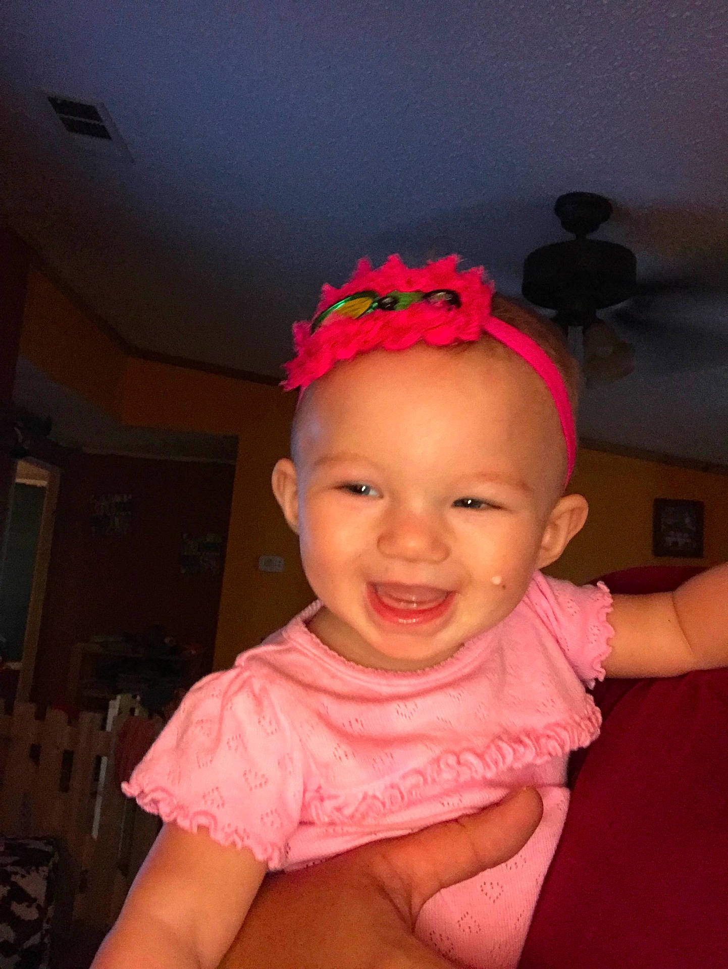 Kinlee is registered to the contest to win money with this photo: cheek, child, ear, eye, face, finger, forehead, girl, hair, hand, head, human_hair_color, infant, joy, mouth, nose, person, pink, product, skin