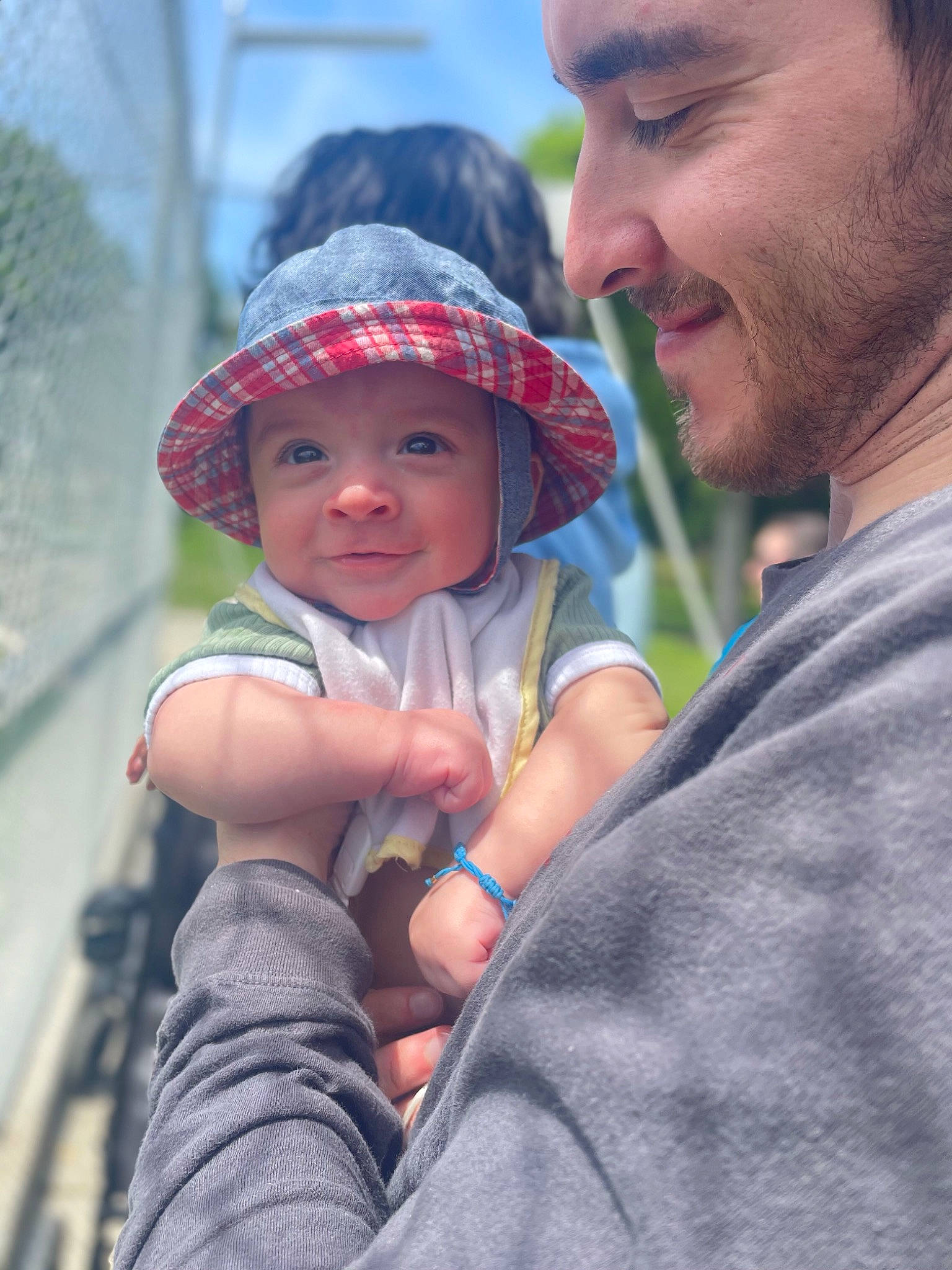 Matías is registered to the contest to win money with this photo: baby, baseball_cap, beard, cap, child, event, fun, grass, happy, hat, headgear, headwear, human, human_body, joy, organ, person, plant, recreation, skin