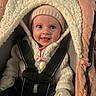 Rosalina joined the competition — help win amazing prizes! baby, child, smiling, car_seat, pacifier, knitted_hat, fluffy_jacket, mittens, seatbelt, cozy, warm_clothing, infant, person, portrait, indoor, close_up, cute, happy, soft_texture, zipped_jacket