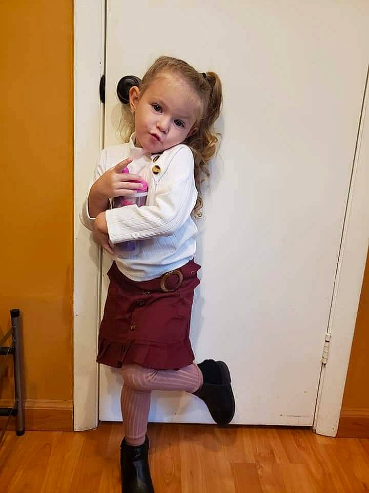 Mariangela joined the competition — help win amazing prizes! abdomen, child, clothing, costume, footwear, joint, knee, leg, person, pigtail, pink, shoe, standing, toddler, trunk, uniform