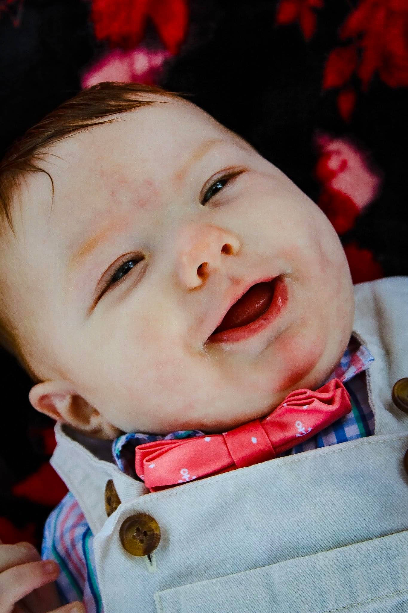 Hudson joined the competition — help win amazing prizes! baby, baby_toddler_clothing, cheek, chin, collar, eye, eyebrow, facial_expression, happy, iris, lip, mouth, nose, outerwear, person, pink, red, skin, sleeve, smile