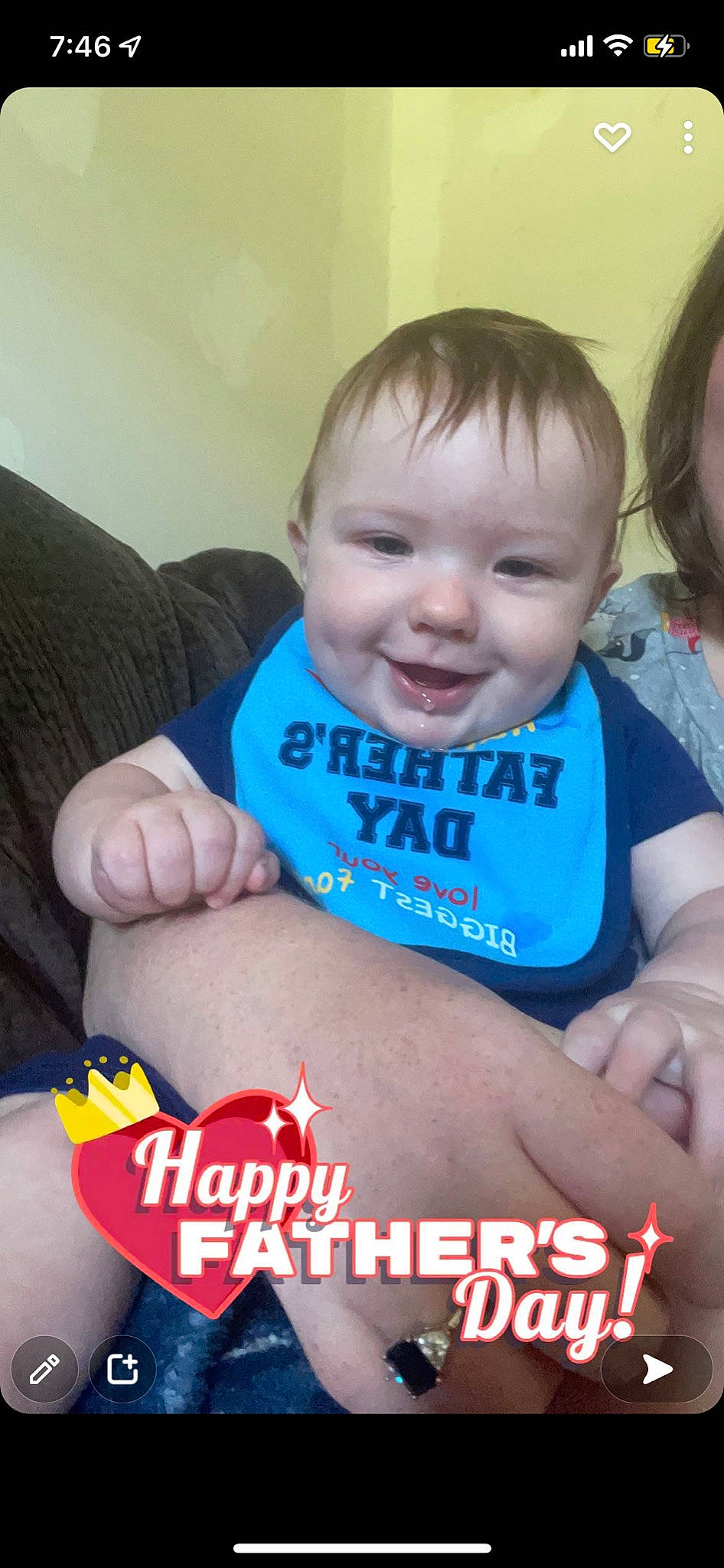 Hudson is registered to the contest to win money with this photo: arm, baby, baby_toddler_clothing, cheek, clothing, eye, eyebrow, face, facial_expression, finger, gesture, hand, happy, joy, mouth, muscle, neck, person, skin, sleeve