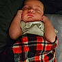 baby, sleeping, blanket, plaid, red, black, white, infant, cozy, hands, peaceful, resting, cute, child, soft, portrait, indoors, warm, comfort, toddler