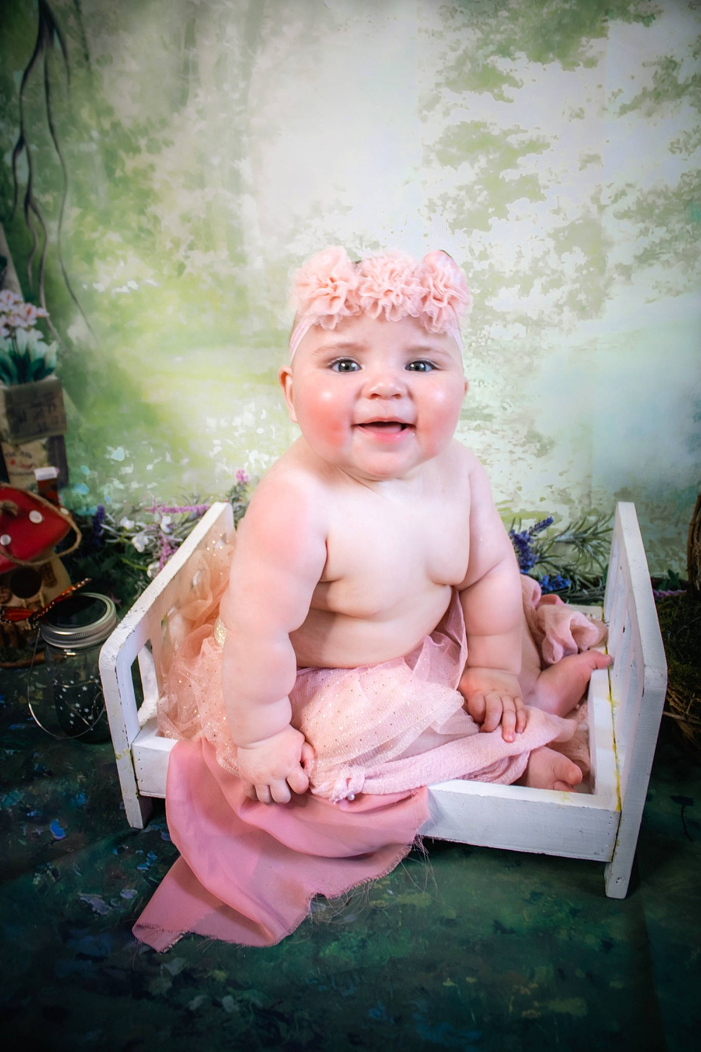 Wynter is registered to the contest to win money with this photo: art, baby, baby_products, baby_toddler_clothing, child, flash_photography, fun, grass, happy, head, headpiece, headwear, jewellery, joy, leisure, peach, person, pink, plant, sitting