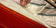 Calyn is registered to the contest to win money with this photo: newborn, baby, sleeping, hospital, bassinet, blanket, hat, wrapped, infant, bed, wood, drawer, peaceful, cozy, cute, portrait, person, indoor, soft_light, resting